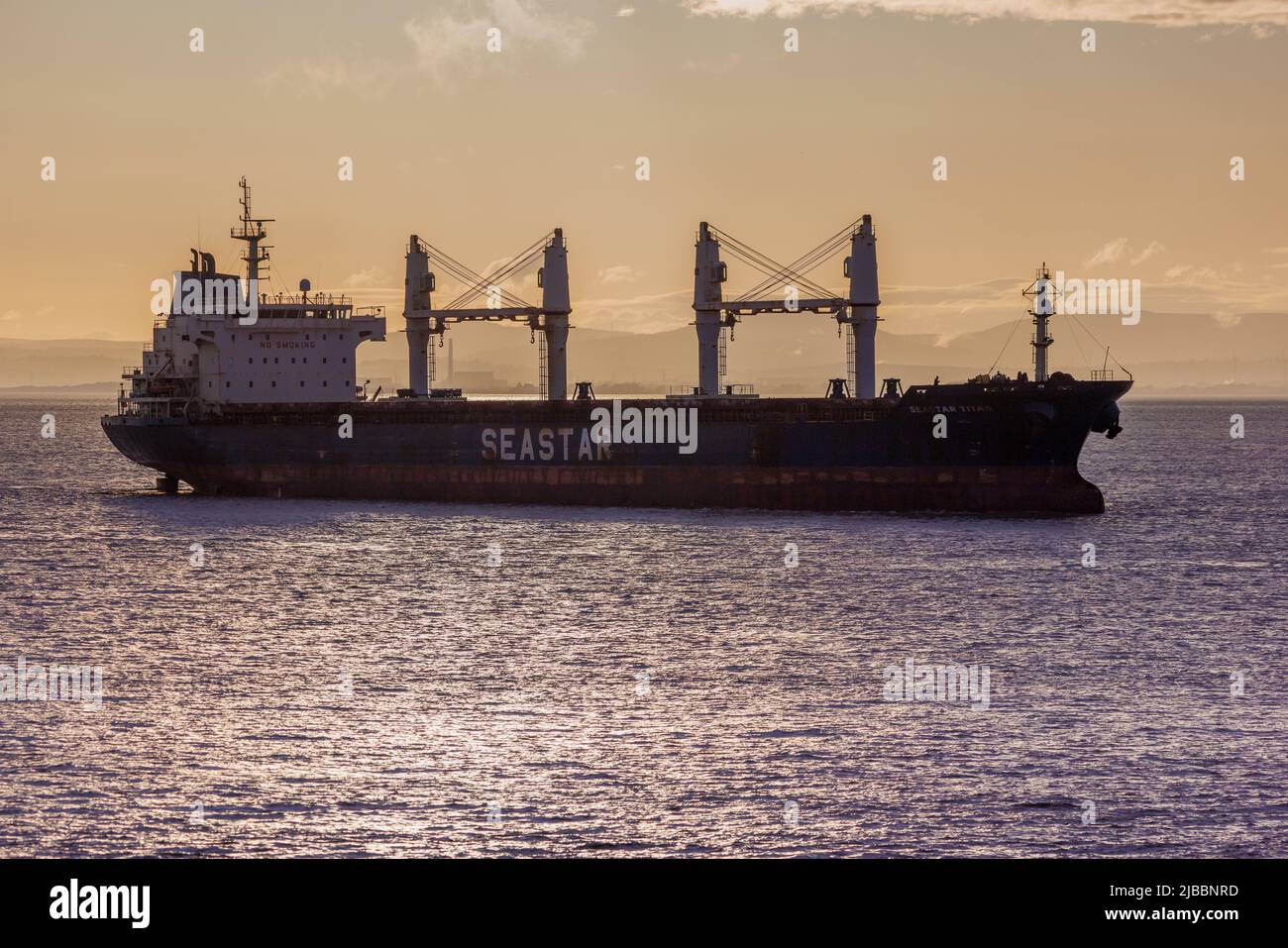 Bulk carrier in silhouette Stock Photo