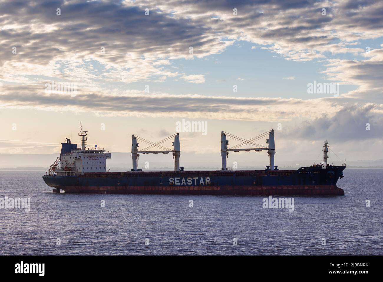 Bulk carrier  heading into dock Stock Photo
