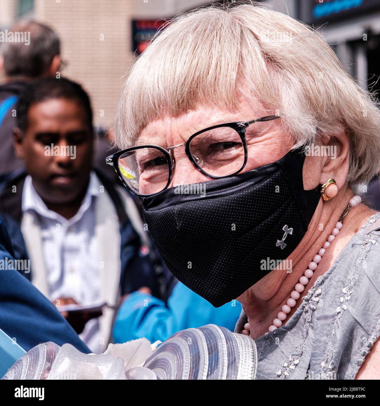 Older woman wearing glasses hi-res stock photography and images - Alamy