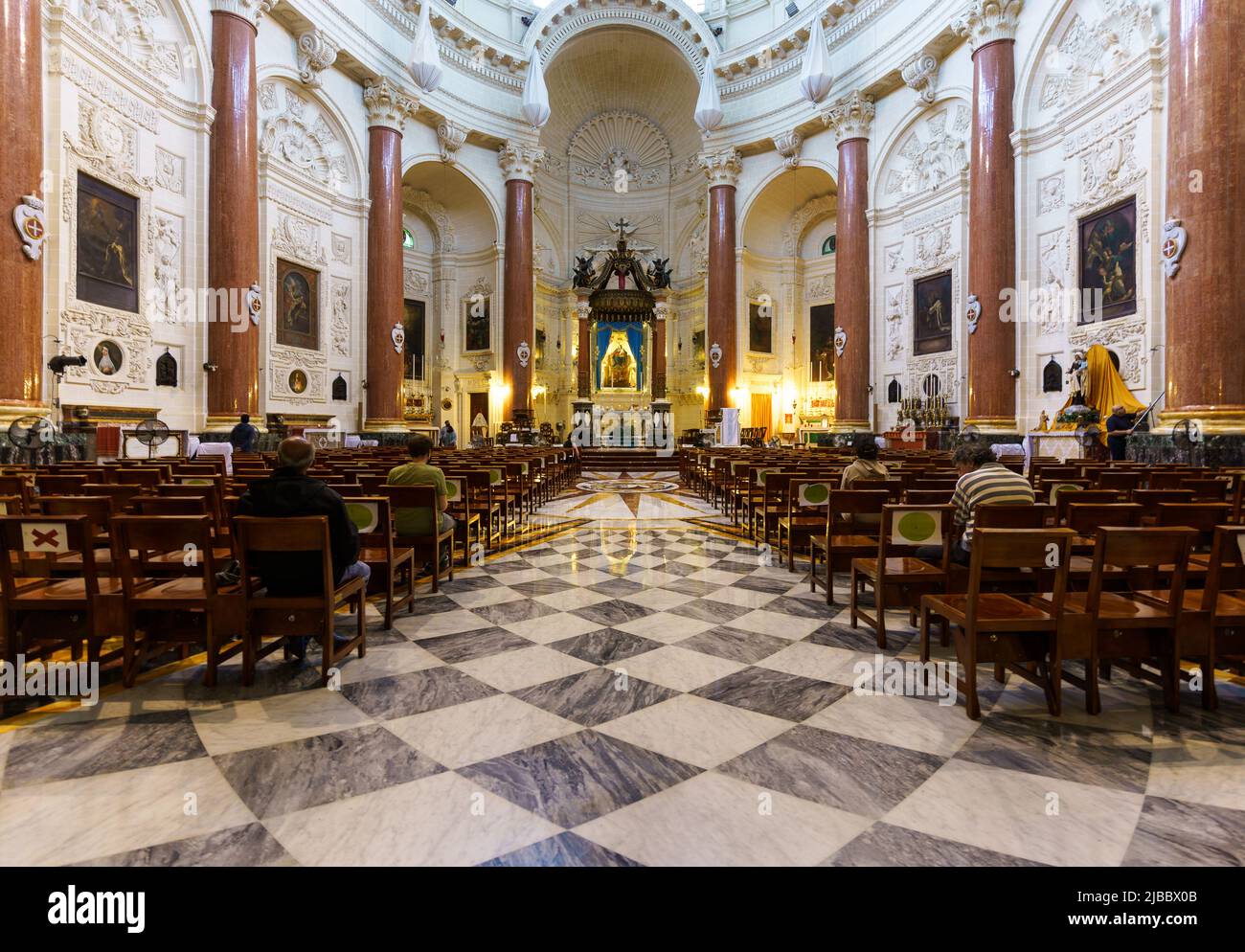 Valletta, Malta - November 27 2021: Interior view of the famous Basilica of Our Lady of Mount Carmel in Valletta medieval old town that dates back to Stock Photo