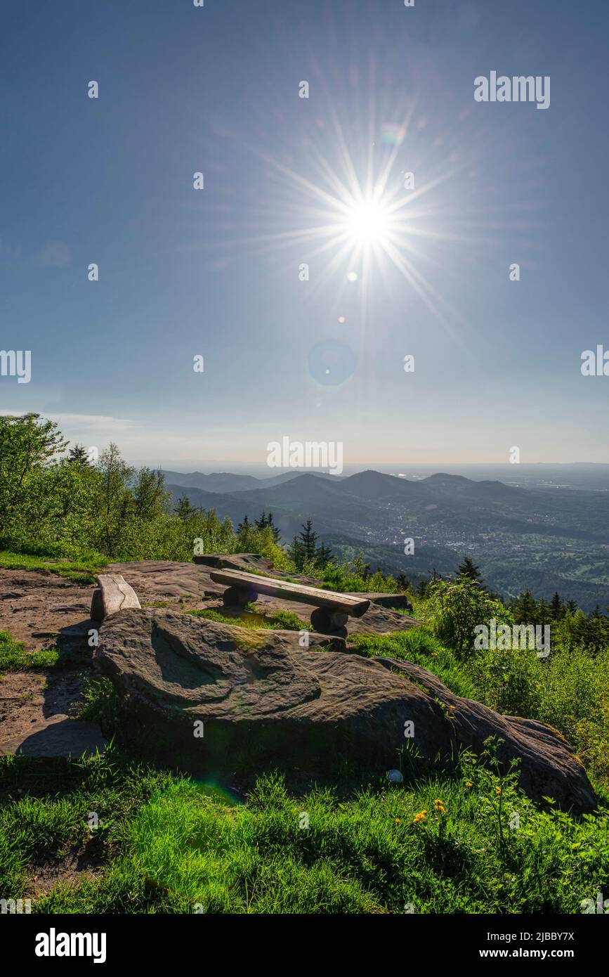 Wooden benches at the lookout point from the Devil's Mill in the Black Forest with a view of the Murg valley, the Rhine valley and the Vosges Stock Photo