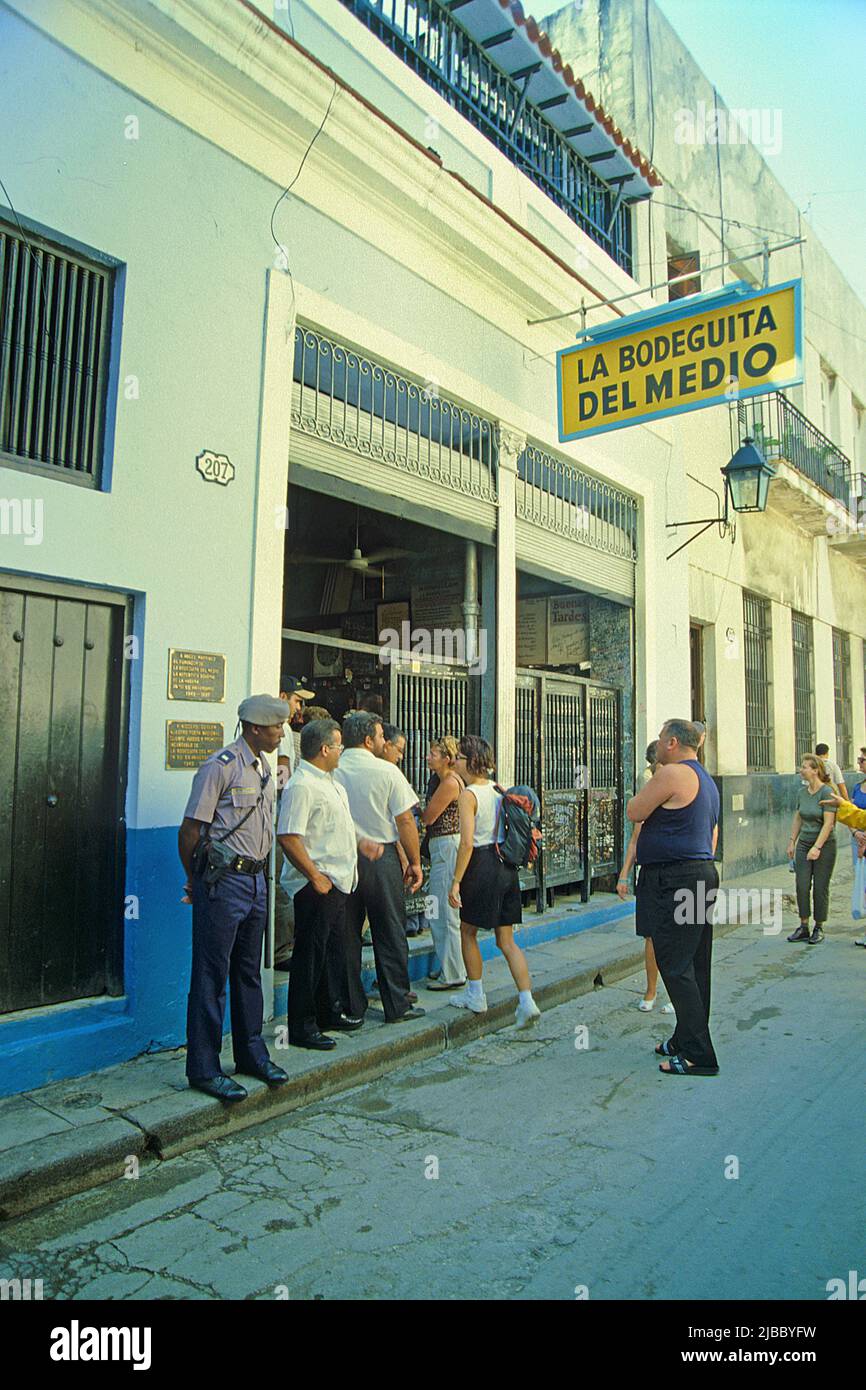 Locals and tourists at the bar La Bodeguita del Medio, most popular bar in Havana, Cuba, Caribbean Stock Photo