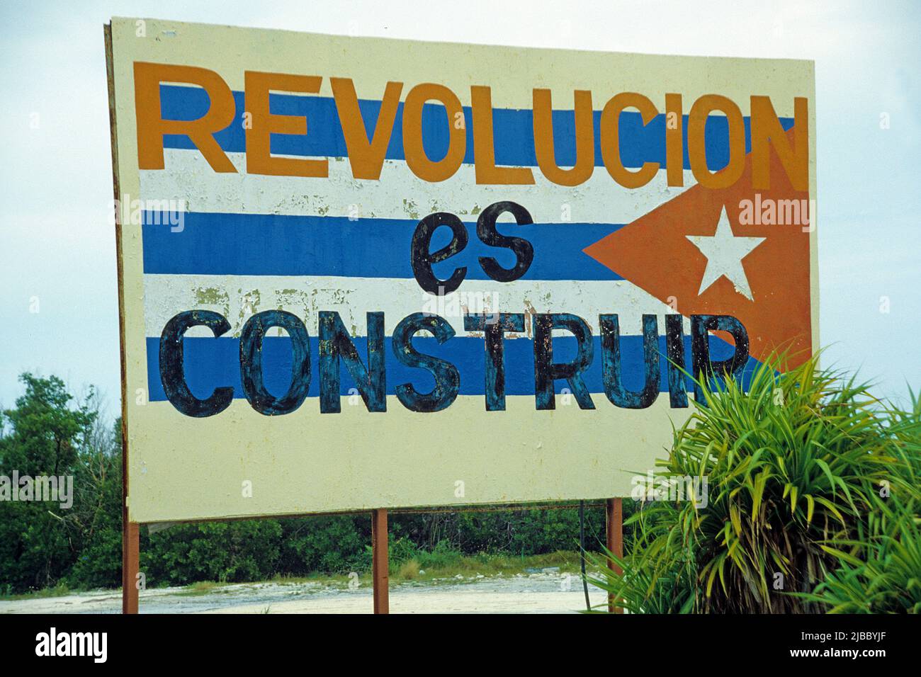Revolucion es Construir, means, translated Revolution is building, central propaganda slogan, Cuba, Caribbean Stock Photo