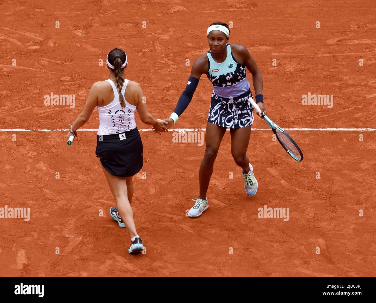 Tennis - French Open - Roland Garros, Paris, France - June 5, 2022 Cori  Gauff and Jessica Pegula of the U.S. react during the women's doubles final  against France's Caroline Garcia and