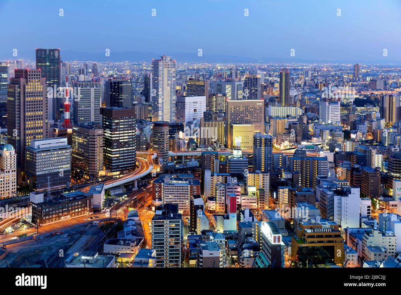 Japan. Kansai. Osaka. The business financial district at dusk Stock Photo