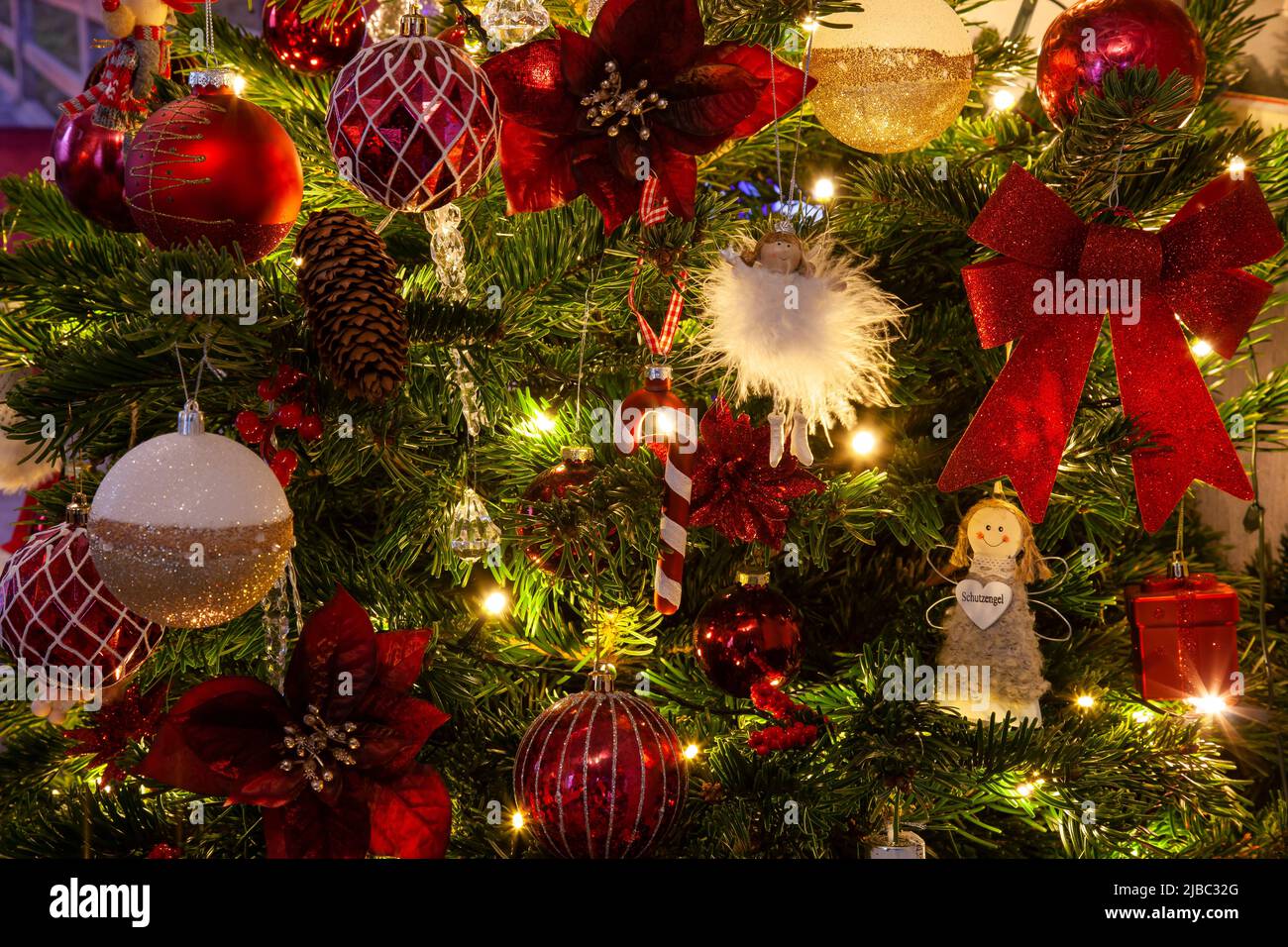 Colourful Christmas baubles and fairy lights, Christmas tree, Stock Photo