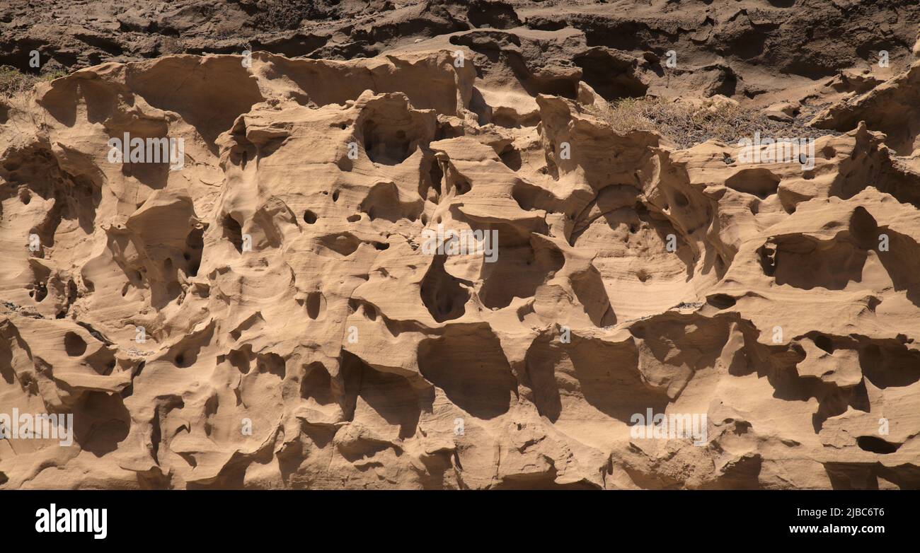 Gran Canaria, amazing sand stone erosion figures in ravines on Punta de las Arenas cape on the western part of the island, also called Playa de Artena Stock Photo