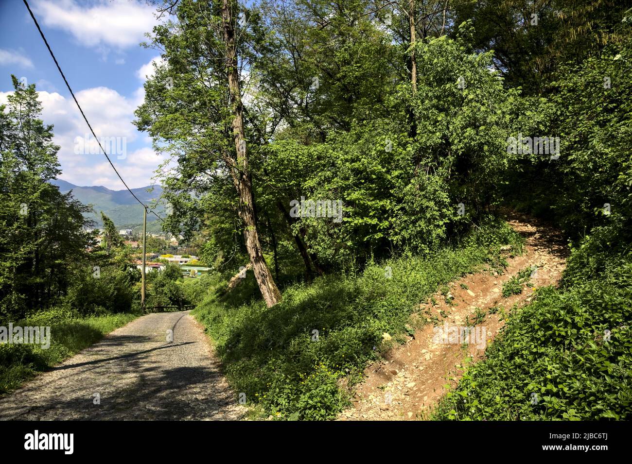 Intersection dirt path paved road hi-res stock photography and images ...