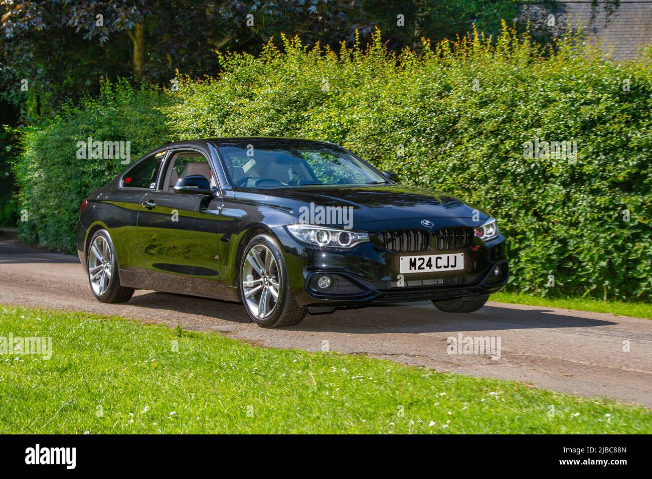 2016 black BMW 418 120D M Sport 1995cc Diesel arriving in Worden Park Motor Village for the Leyland Festival, UK Stock Photo