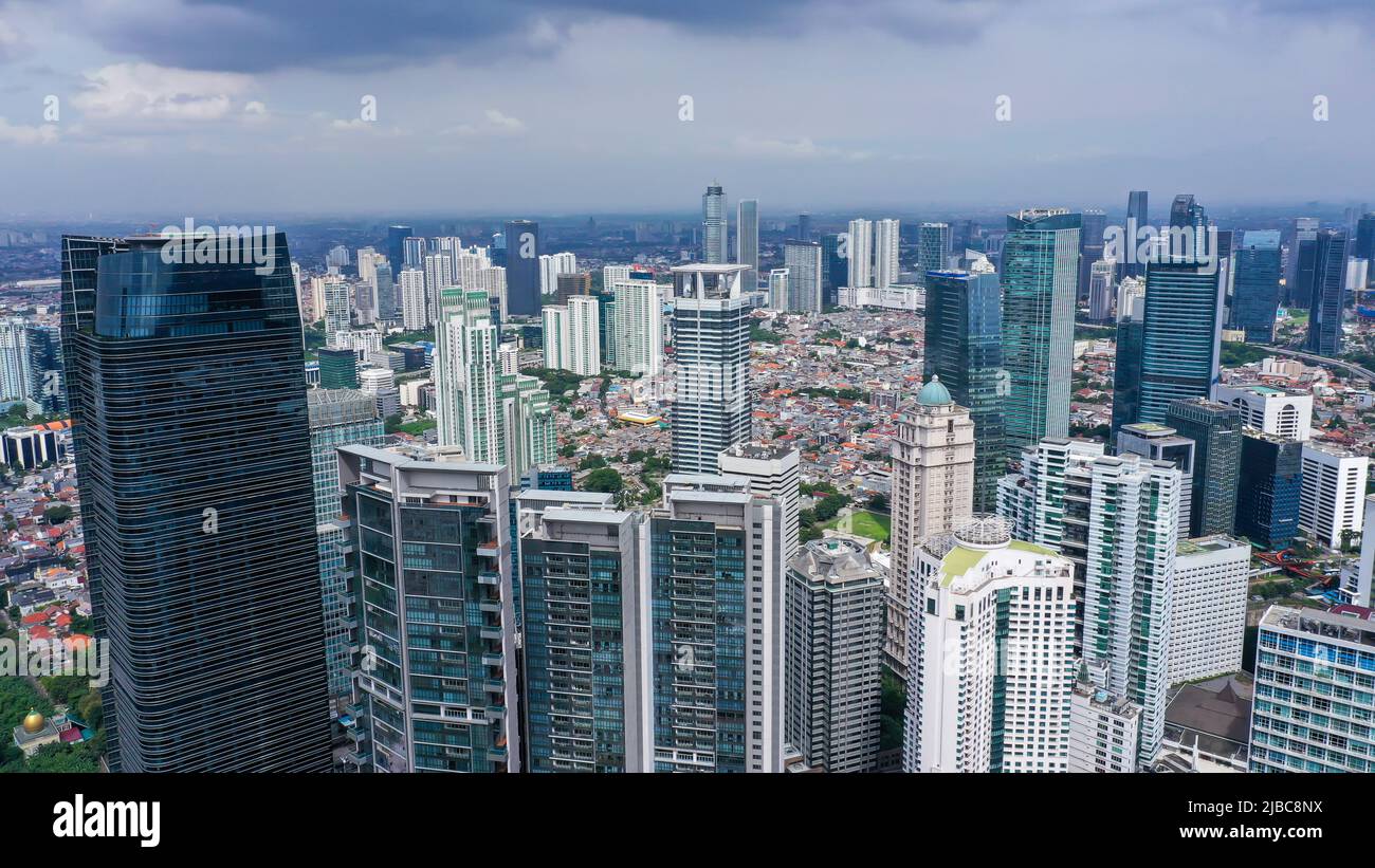 The business district of Jakarta along Jalan Sudirman, one of the city main avenue, is line with many banks and other office towers. Jakarta is Stock Photo