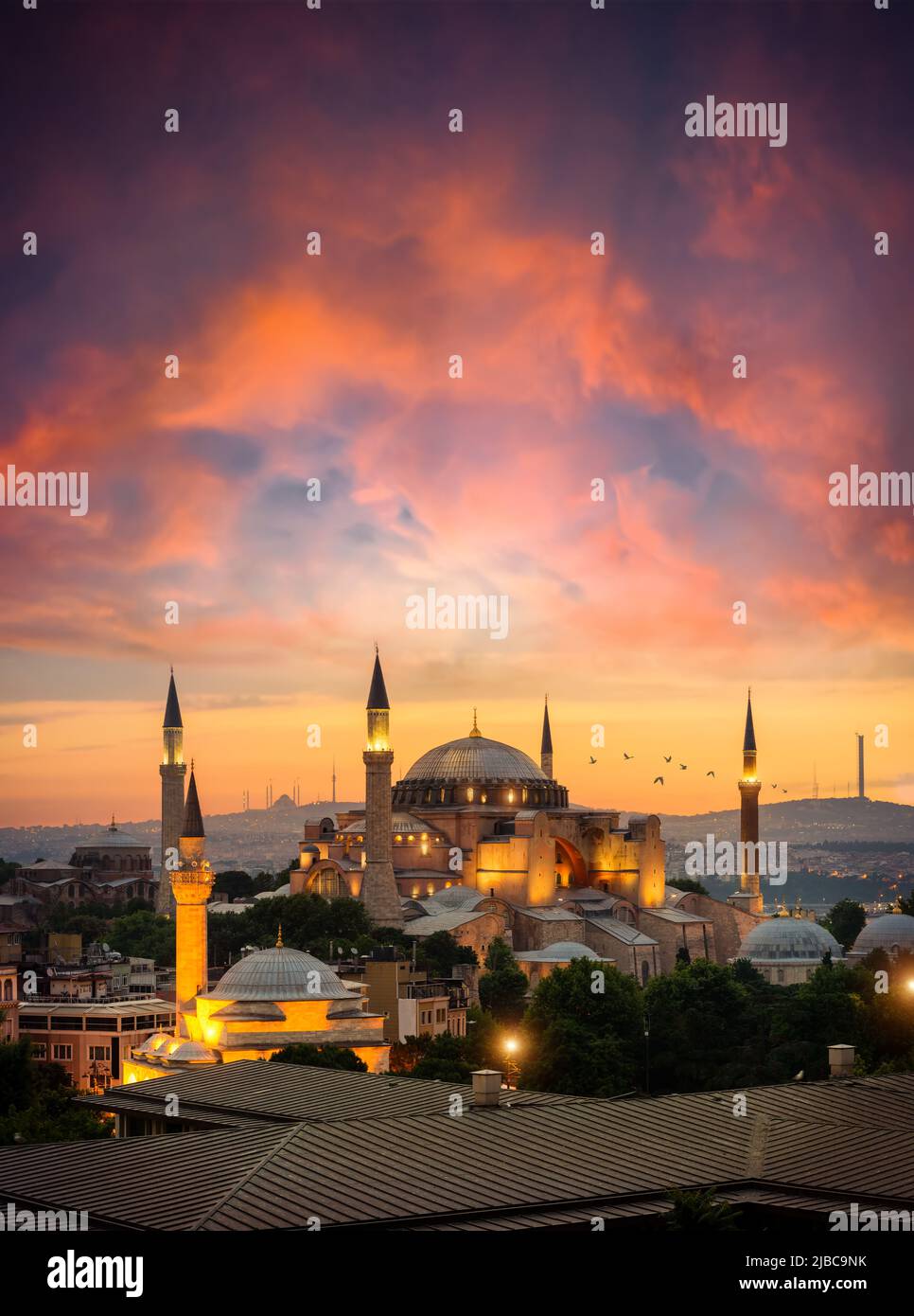 Illuminated Hagia Sophia and beautiful sunset in Istanbul, Turkey Stock Photo