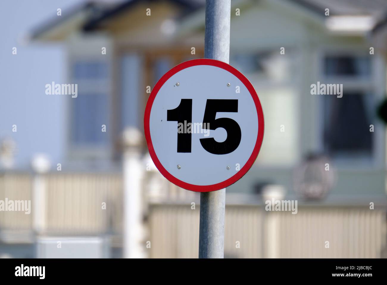 15 mile per hour speed limit sign on caravan holiday park. Stock Photo