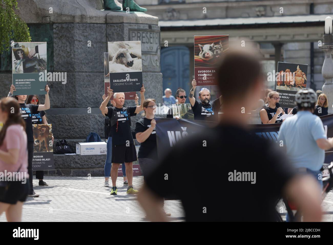 Protesters carry placards during a global National animal rights day ...
