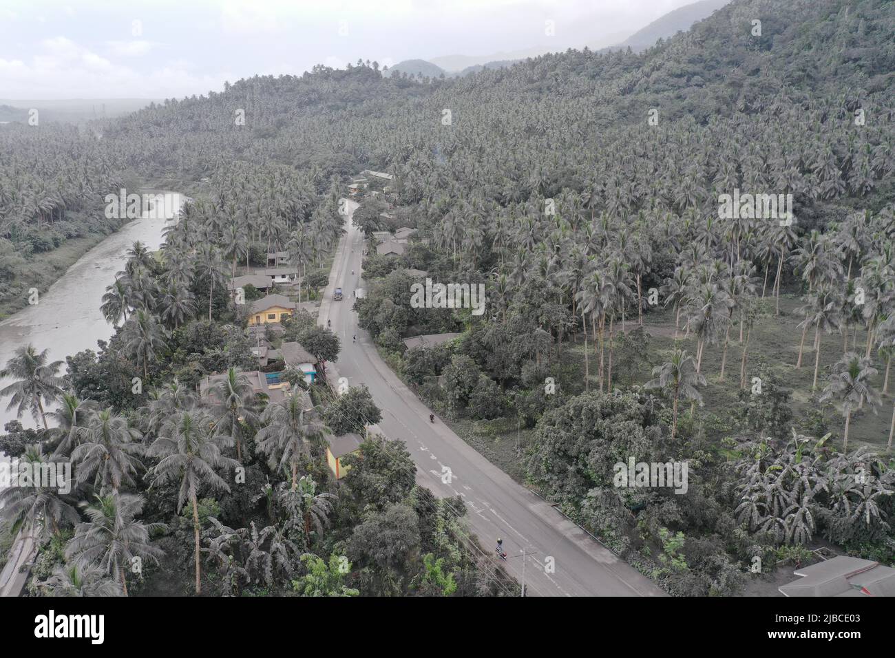 Bulusan, Philippines. 5th June 2022.   (220605) -- SORSOGON PROVINCE, June 5, 2022 (Xinhua) -- Aerial photo shows an ash-covered town after the phreatic eruption of Bulusan volcano in Sorsogon Province, the Philippines on June 5, 2022. The Philippine Institute of Volcanology and Seismology on Sunday raised the alert level for Bulusan volcano from zero to one after the volcano in Sorsogon province, southeast of Manila, spewed a grey plume about a kilometer high into the sky. (Sorsogon Provincial Information Office/Handout via Xinhua) Credit: Xinhua/Alamy Live News Stock Photo