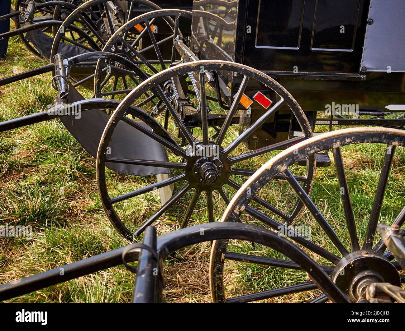 Wheels of Amish buggies parked at the Wakefield Mud Sale, Lancaster, PA, USA Stock Photo