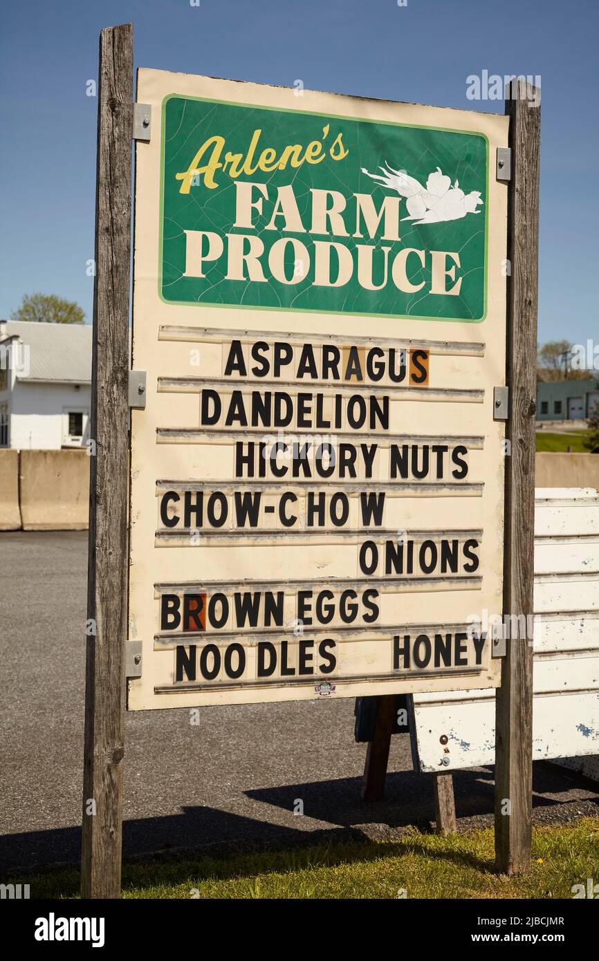 Farm Market Sign offering Spring crops, Bowmansville, Lancaster Countty, Pennsylvania, USA Stock Photo