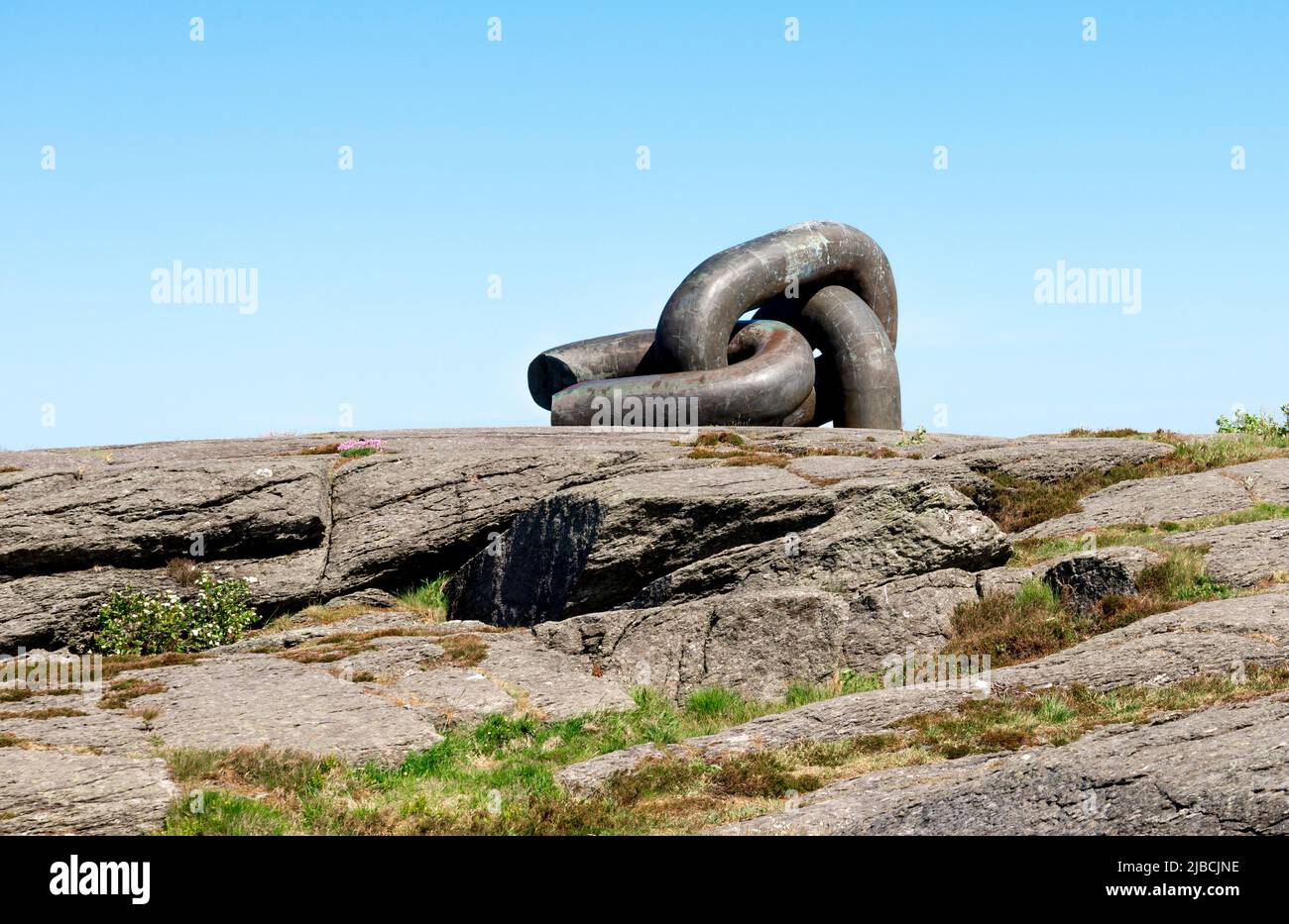 A Broken Chain monument on North Sea coast in Kvernevik suburb, Stavanger, Norway, May 2018 Stock Photo