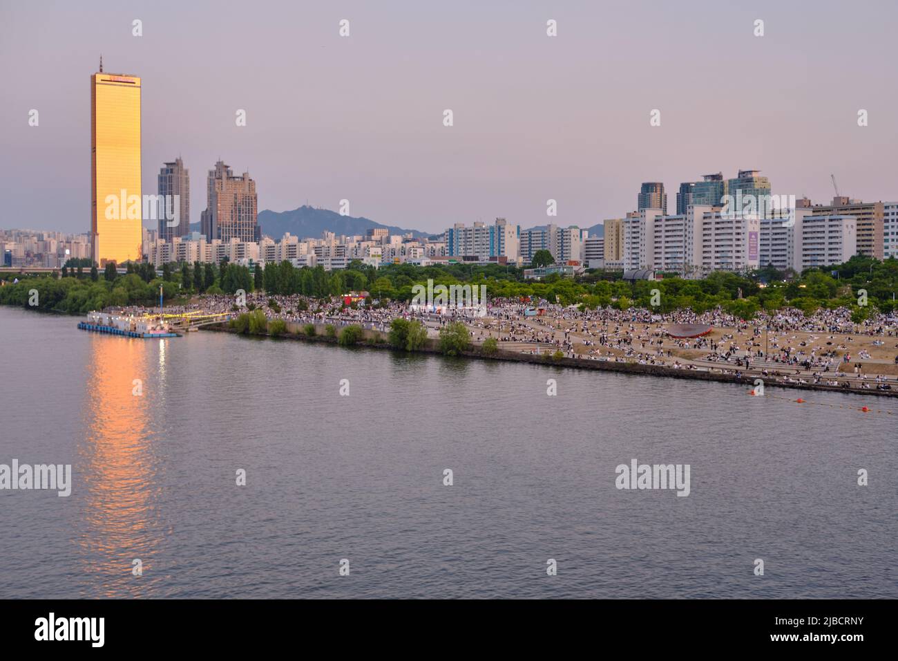Dusk view of Han River and skyscrapers in Yeouido in Seoul, South Korea on 31 May 2022 Stock Photo
