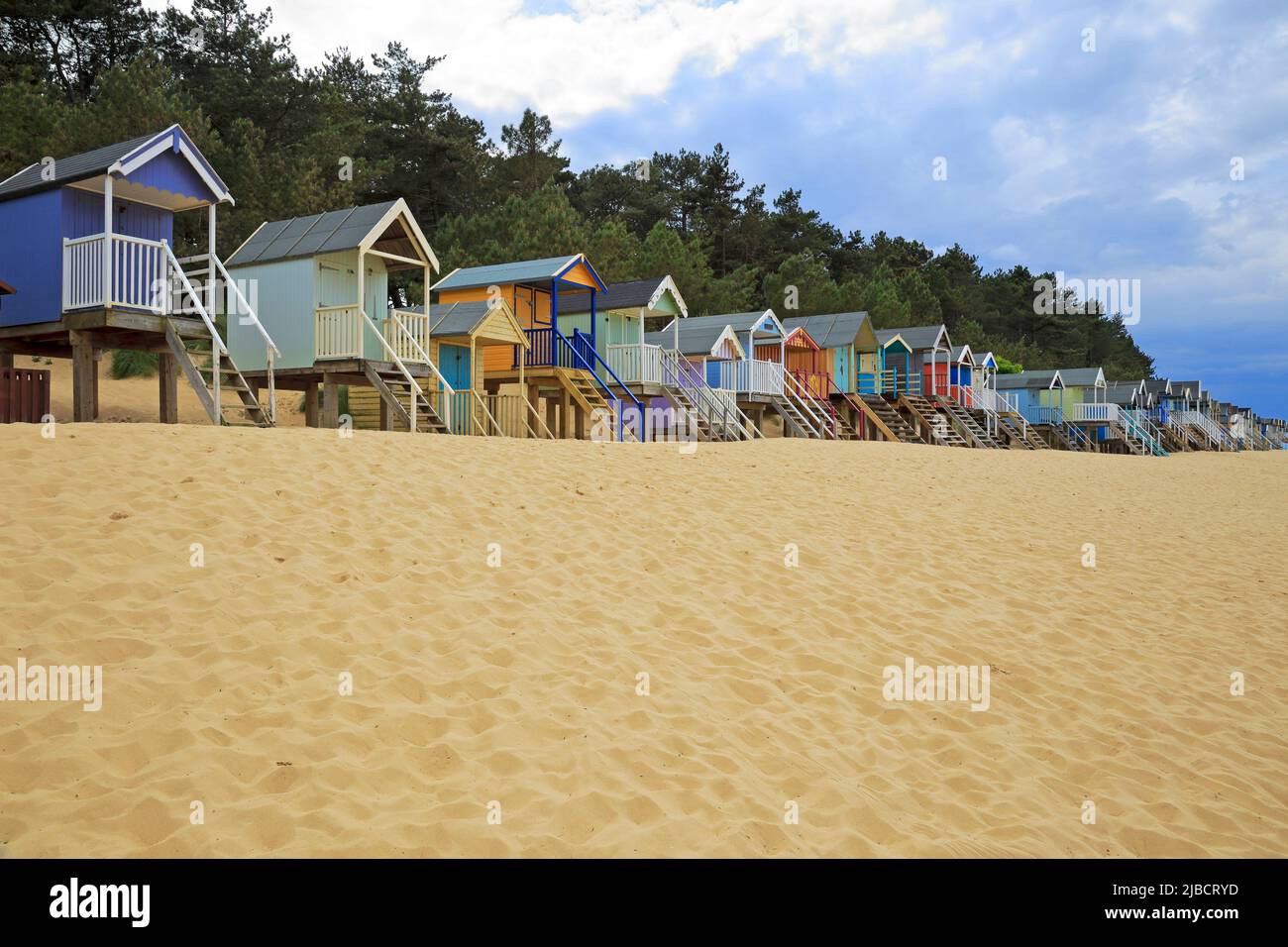 Colourful beach huts on Wells-next-the-Sea beach, Norfolk, England, UK. Stock Photo