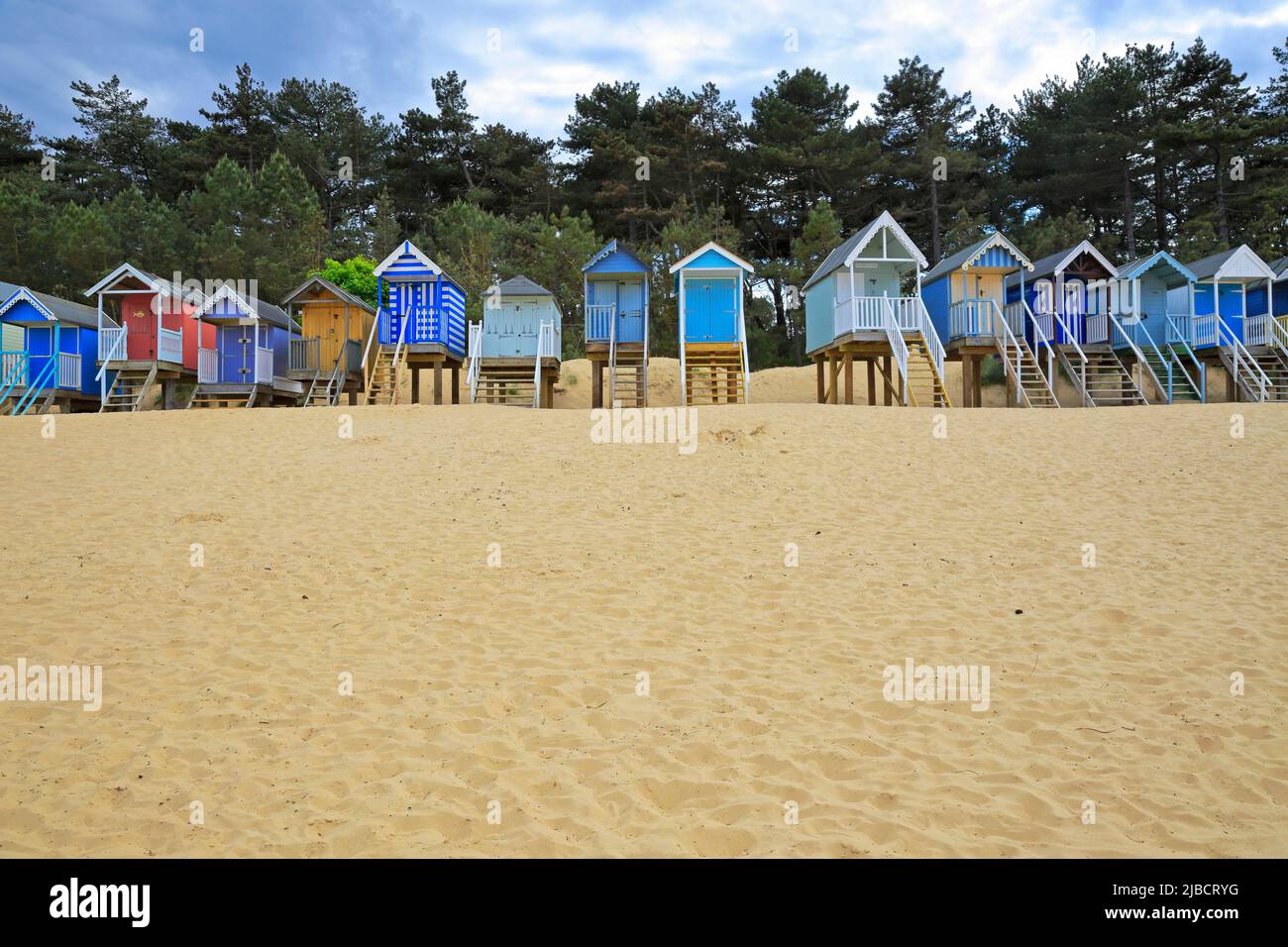 Colourful beach huts on Wells-next-the-Sea beach, Norfolk, England, UK. Stock Photo