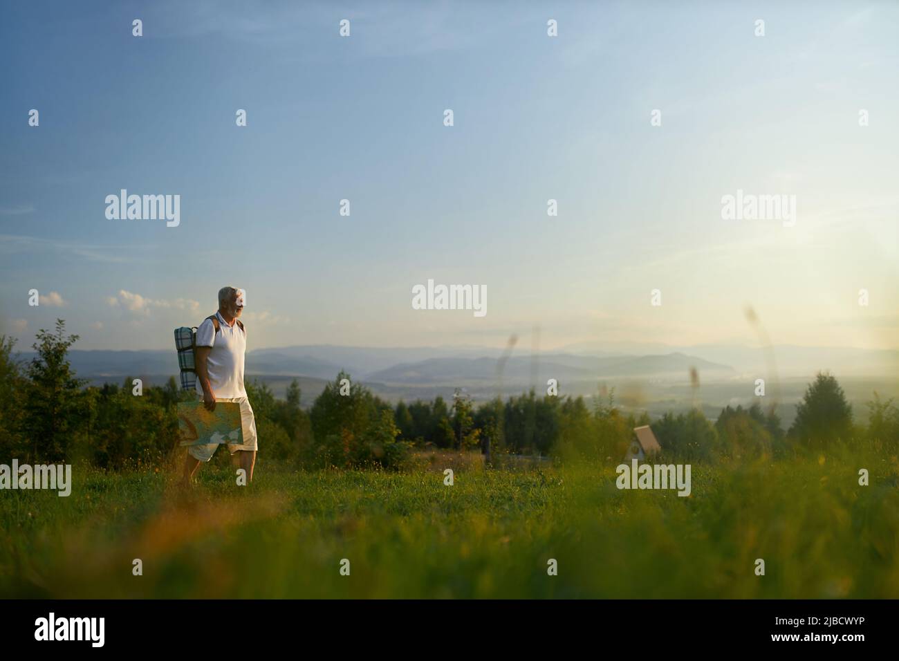 Middle aged man walking alone hi-res stock photography and images - Alamy