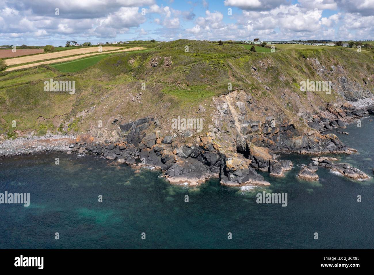 The rugged coastline of Cornwall, England in the Poltesco area as seen from a drone. Stock Photo