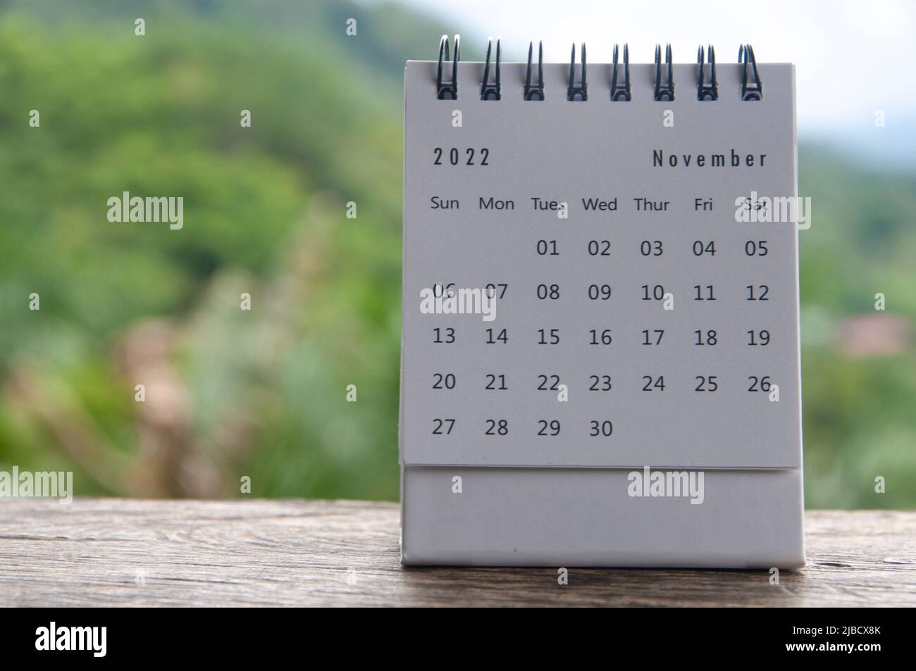 November Month Calendar With Blurred Nature Background Copy Space november-month-calendar-with-blurred-nature-background-copy-space