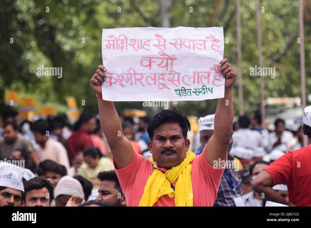 Delhi, India. 05th June, 2022. A man holds placard at a Protest held by ...