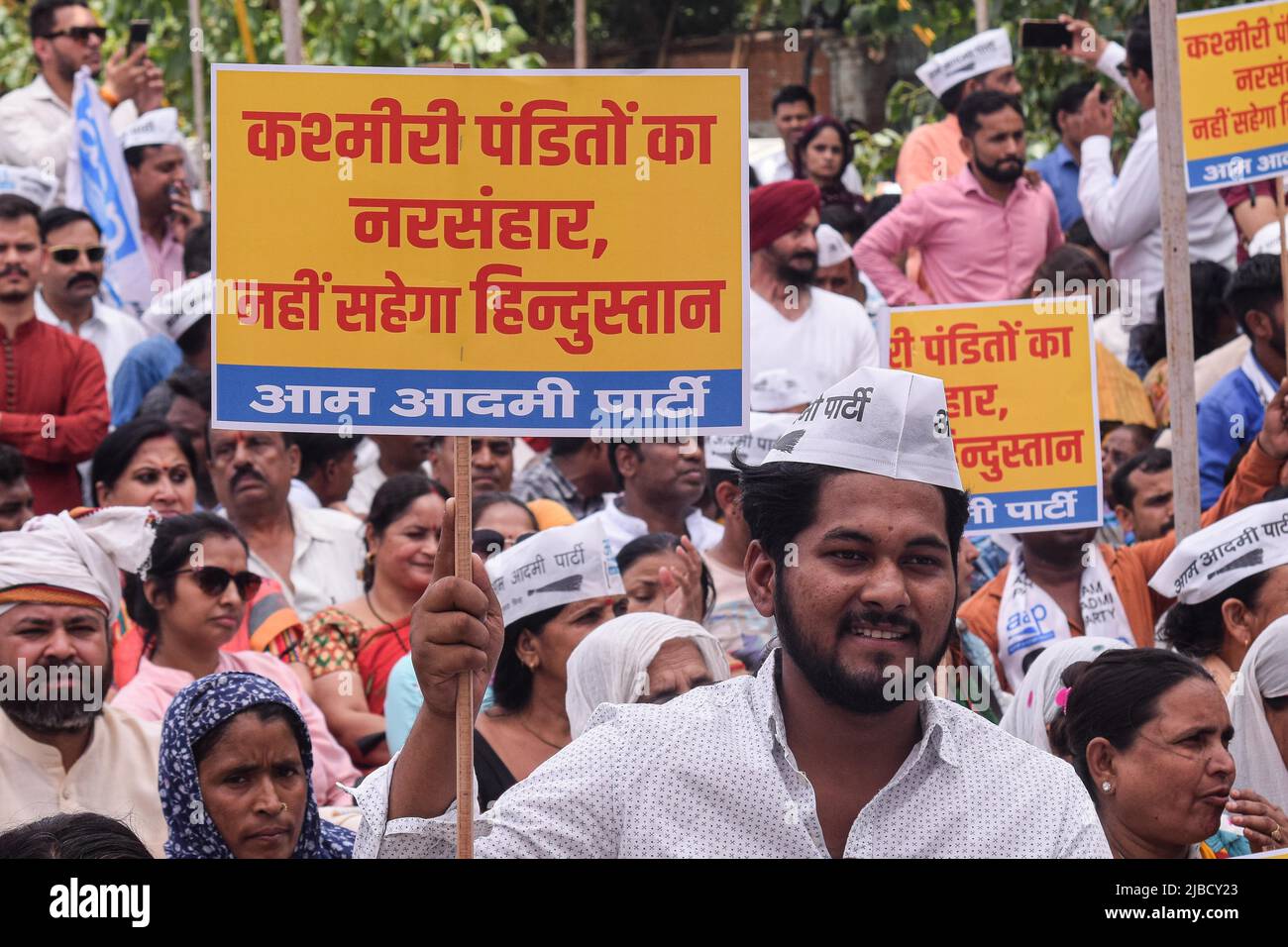Delhi, India. 05th June, 2022. A man holds placard at a Protest held by ...