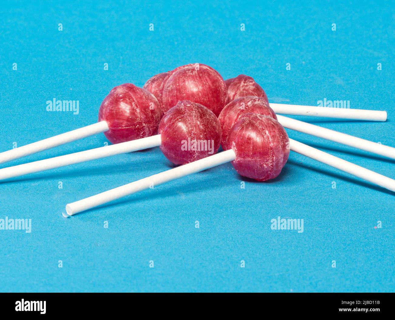 several candies on a blue background. Diabetes concept Stock Photo