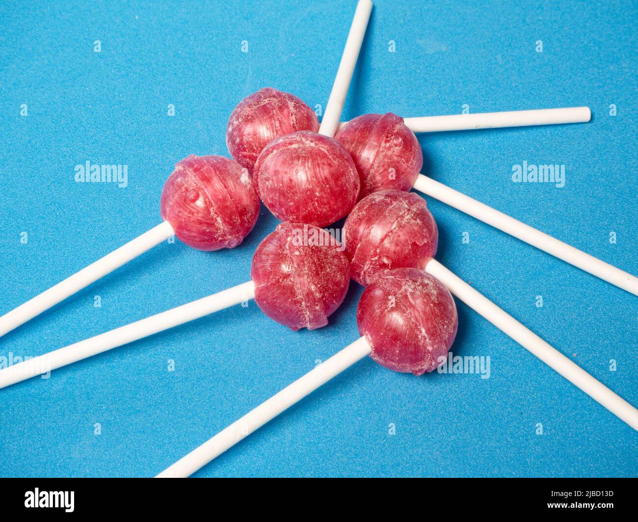 several candies on a blue background. Diabetes concept Stock Photo