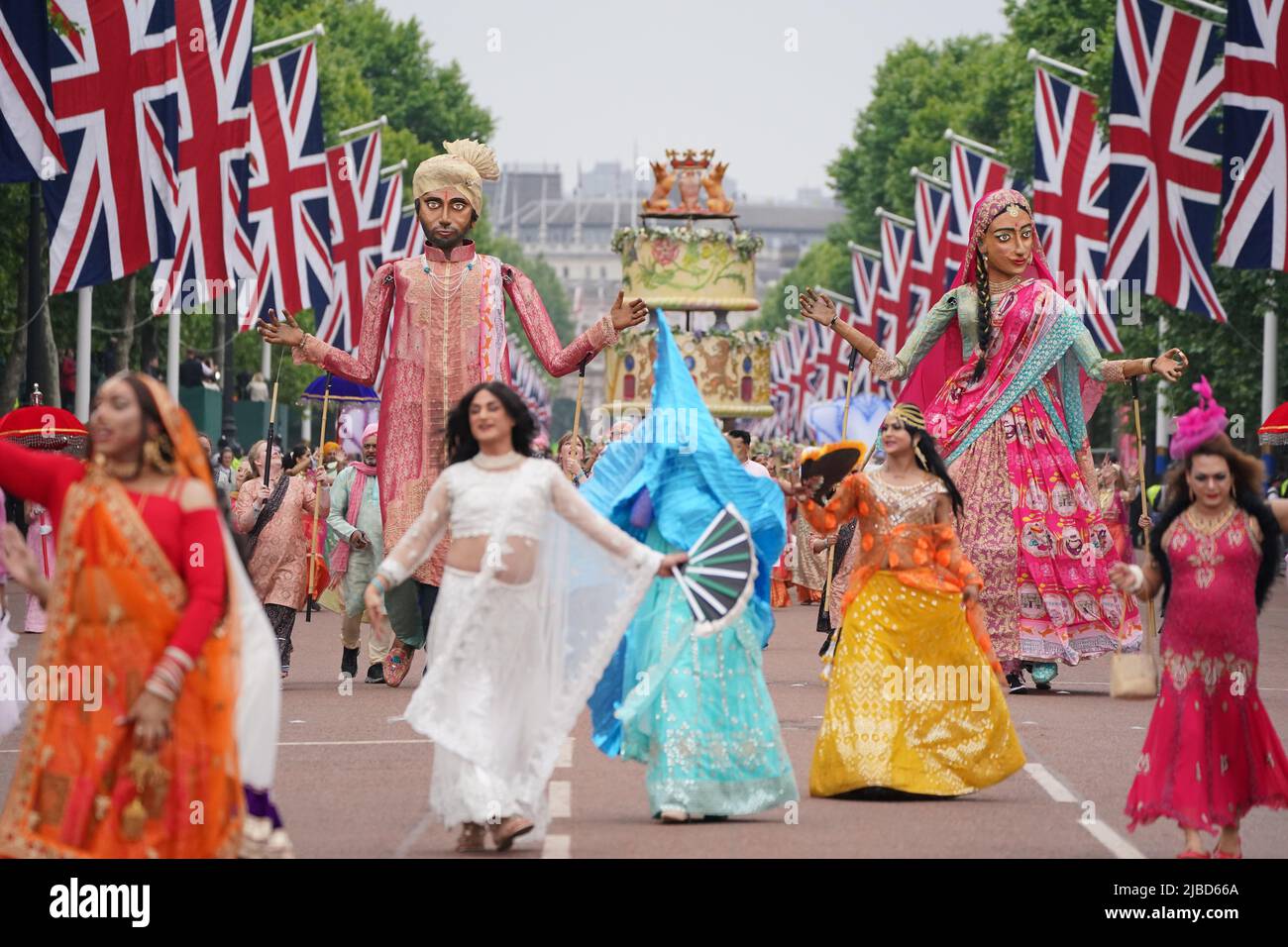 Dancers with giant puppets during the Platinum Jubilee Pageant in front of Buckingham Palace