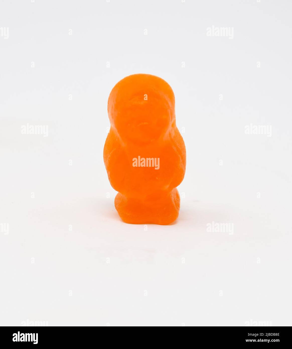 A close up photo of a Orange Jelly baby Stock Photo