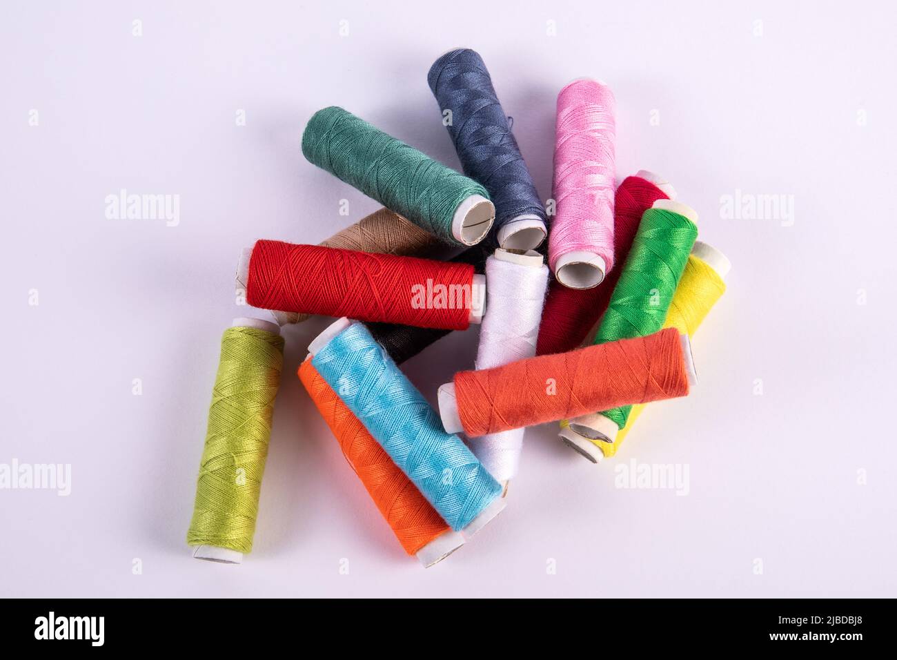 Colored spools threads close hi-res stock photography and images - Alamy