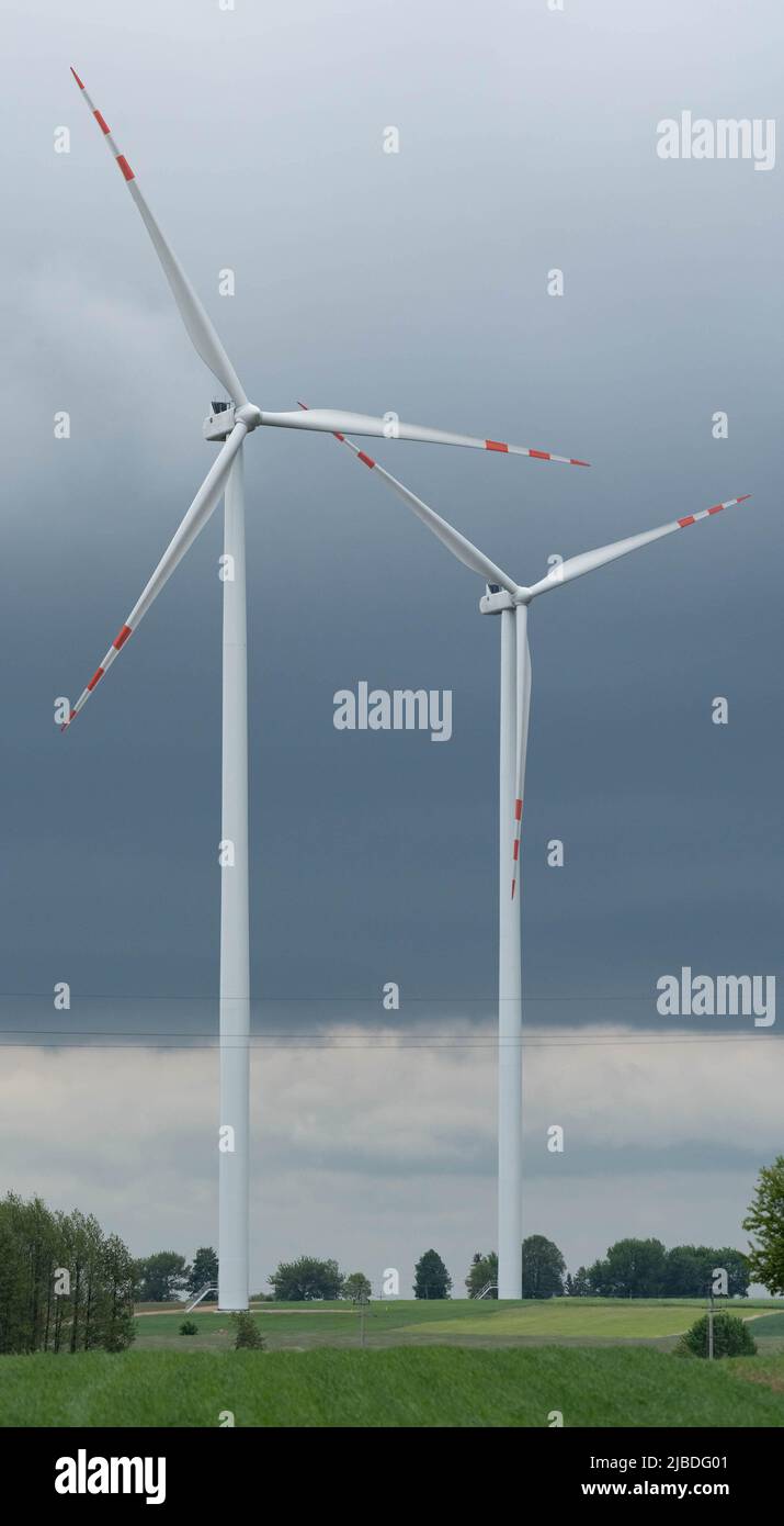 Wind farm in Poland. Windmills in arable fields. Renewable energy