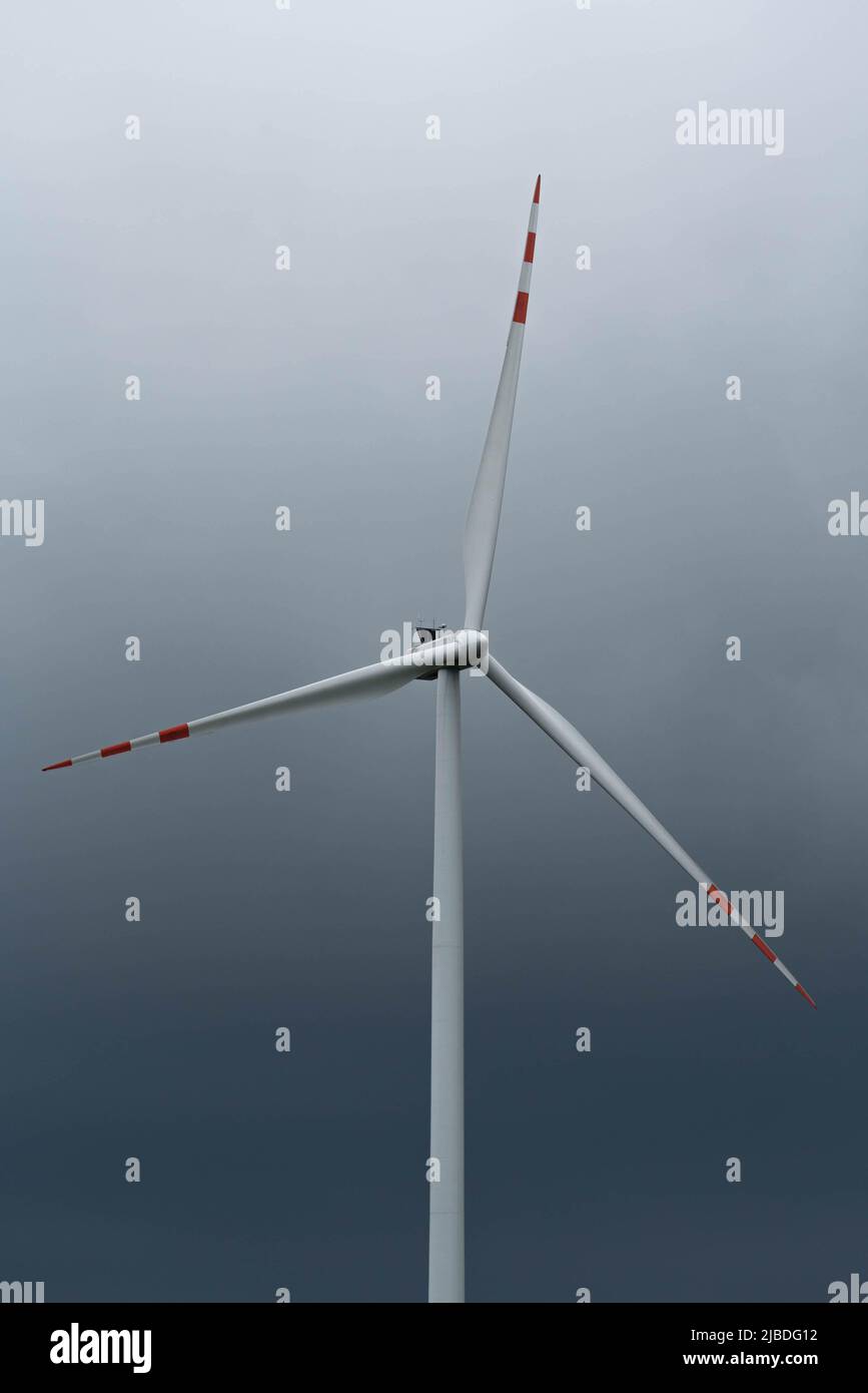 Wind farm in Poland. Windmills in arable fields. Renewable energy