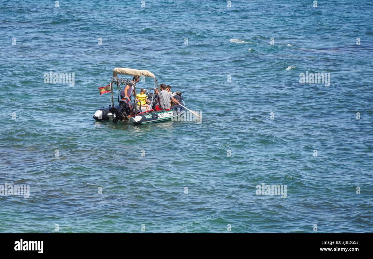 People on Zodiac boat on open sea, Costa del Sol, La Cala, Andalusia, Spain. Stock Photo