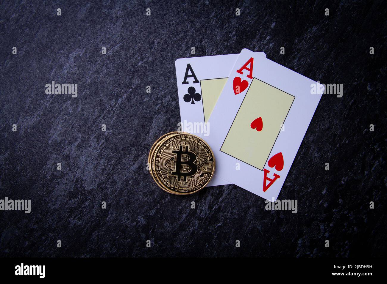 Casino and bitcoin. Chips in the form of bitcoins on the poker table. Poker  game. Coins on the line. Background from needle cards. Copyspace Stock  Photo - Alamy