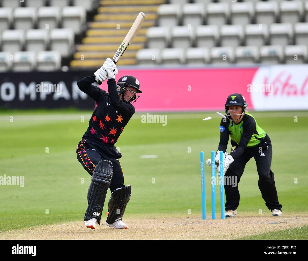 Central Sparks' captain Evelyn Jones is bowled by Sophia Smale of Western Storm in a Charlotte Edwards Cup match.Watched by keeper Nat Wraith. Stock Photo