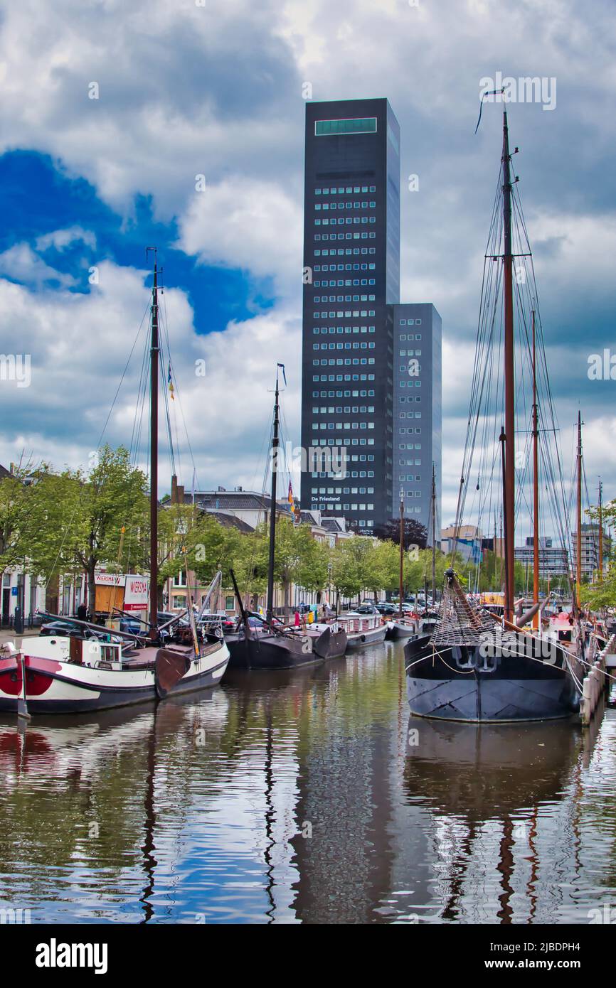 The museum harbour of the city of Leeuwarden, Friesland, the Netherlands, In the background the