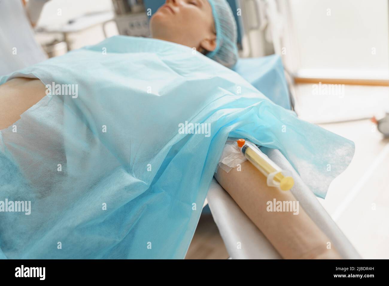 Syringe for administering anesthesia in the patient's arm. General