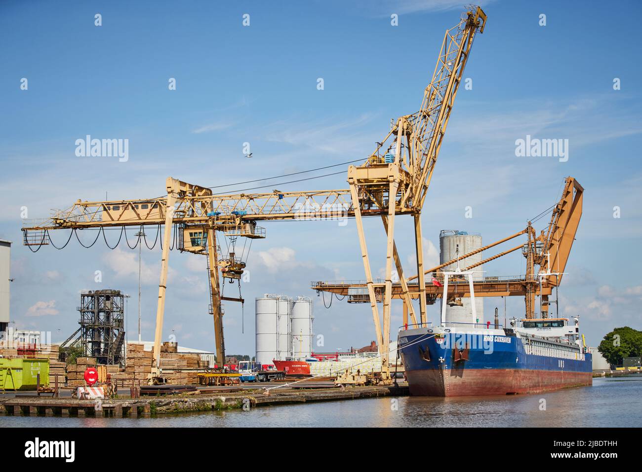 port of Goole docks, a Tom Pudding hoist in Goole docks with St John's Goole behind and vessel