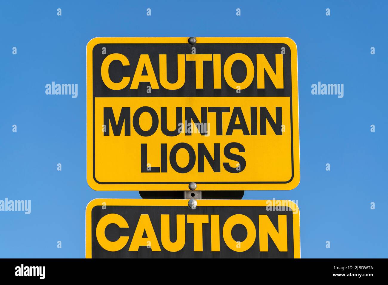 Mountain Lions caution sign near a popular nature park in Southern California. Stock Photo