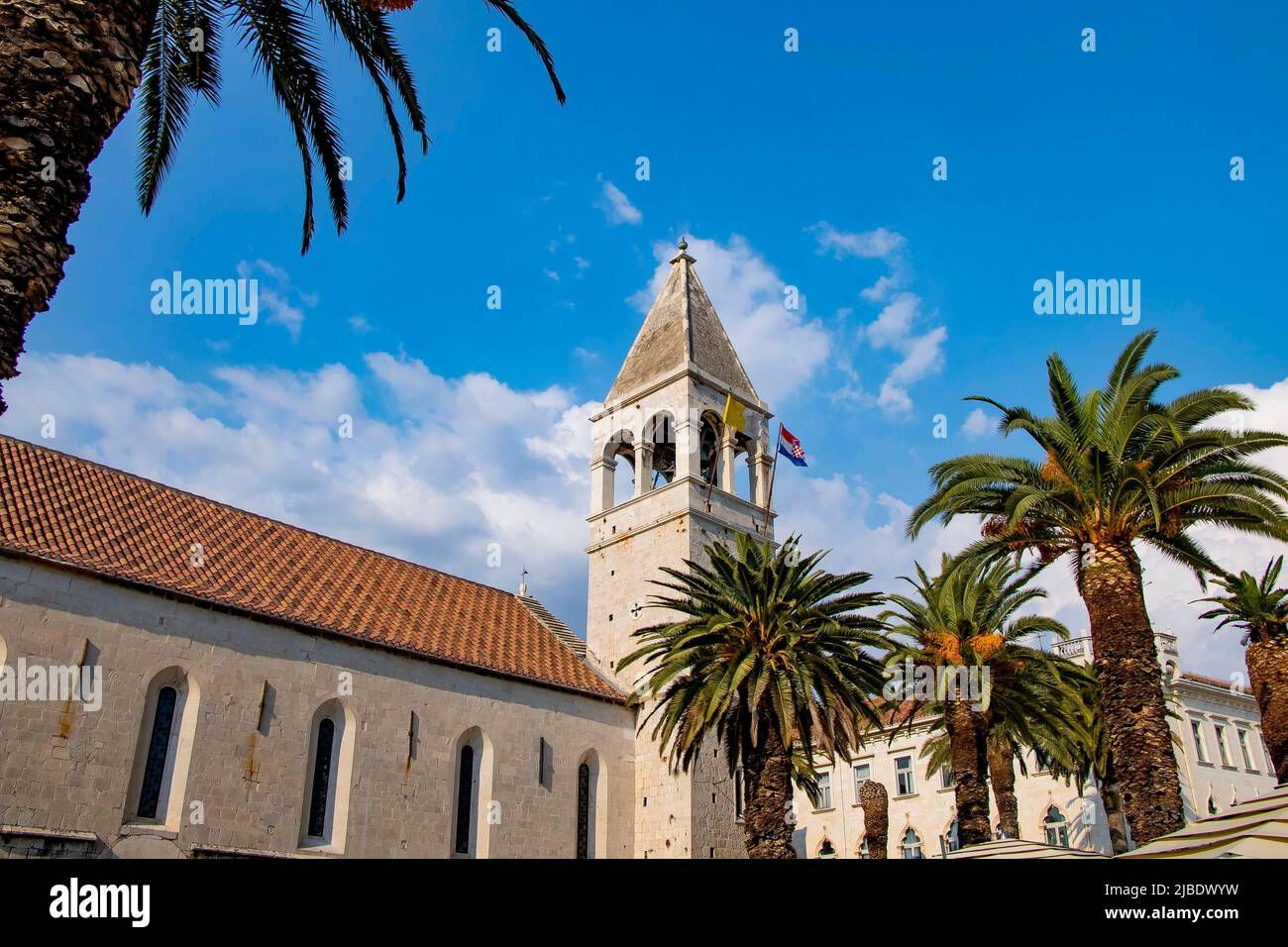 Close up view of town hall on sunny promenade along the pier of old Venetian town, Trogir, Croatia. Stock Photo