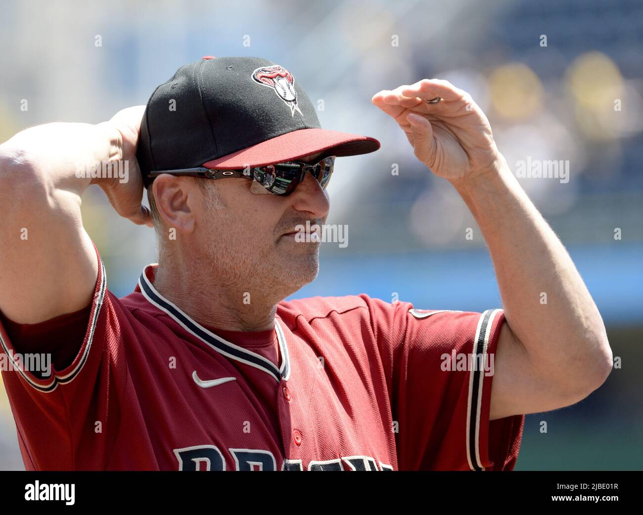 Arizona Diamondbacks starting pitcher Randy Johnson walks back to the  dugout after the third out of the third inning against the Los Angeles  Dodgers July 15, 2004 in Phoenix, AZ. (UPI Photo/Will