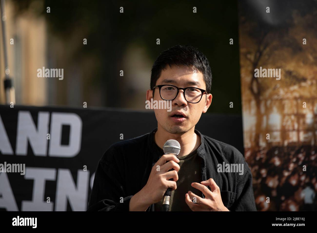 Nathan Law, an activist in exile and former member of the Legislative Council in Hong Kong speaks during the rally outside Downing Street against authoritarian regimes in China and Russia in London. A joint rally of Ukrainian & Hongkongers calling for “Unite for Democracy” organised by Democracy for Hong Kong, Hong Kong Aid, Hong Kong Liberty, Fight for Freedom, Stand with Hong Kong, Hong Kong Assistance and Resettlement Community and Hongkongers in Britain on the day of 33rd anniversary of the Tiananmen Square Massacre. (Photo by May James / SOPA Images/Sipa USA) Stock Photo