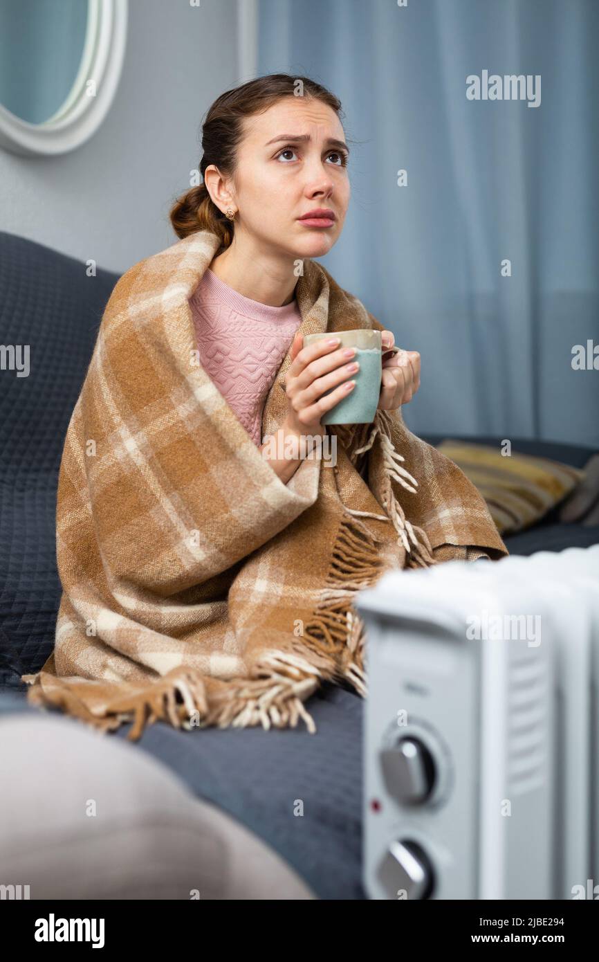 Sad adult woman drinking tea hi-res stock photography and images - Alamy