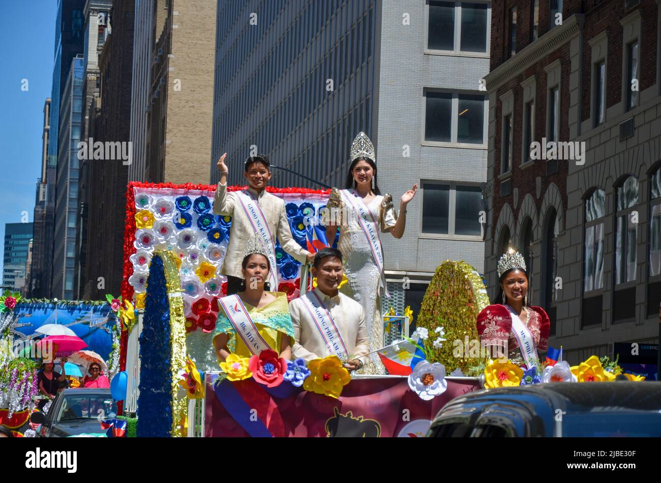 Participants march up Madison Avenue on a float in New York City during
