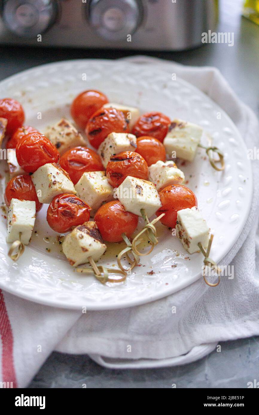 grilled halloumi and tomato skewers with olive oil and ground spices