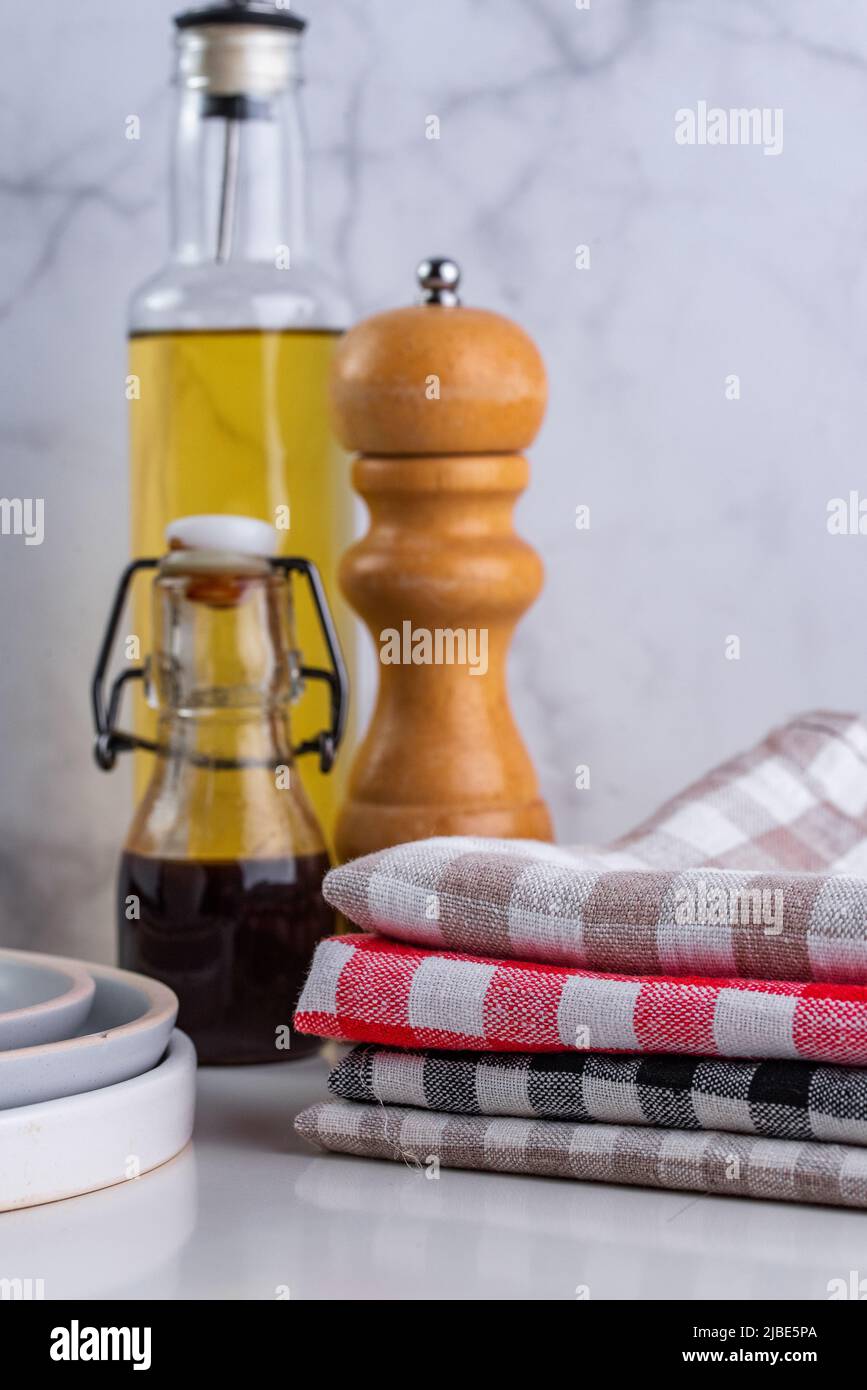 linen towels in a stack on the kitchen table Stock Photo